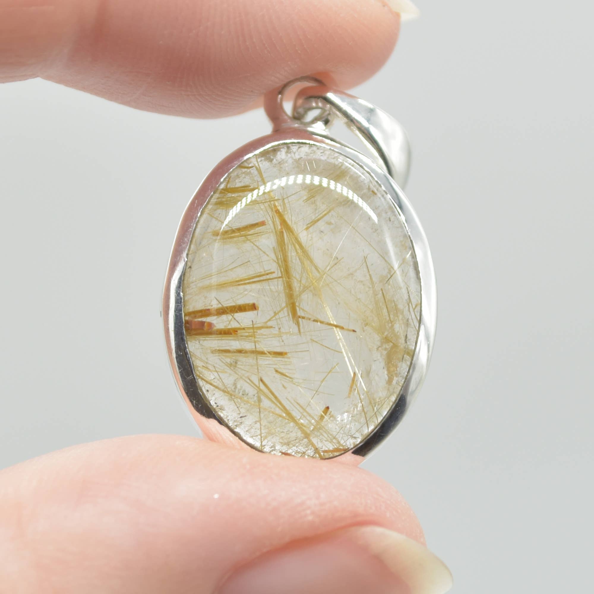 Golden Rutilated Quartz Oval Pendant in Sterling Silver