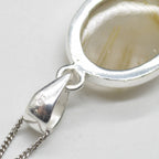 Golden Rutilated Quartz Oval Pendant in Sterling Silver