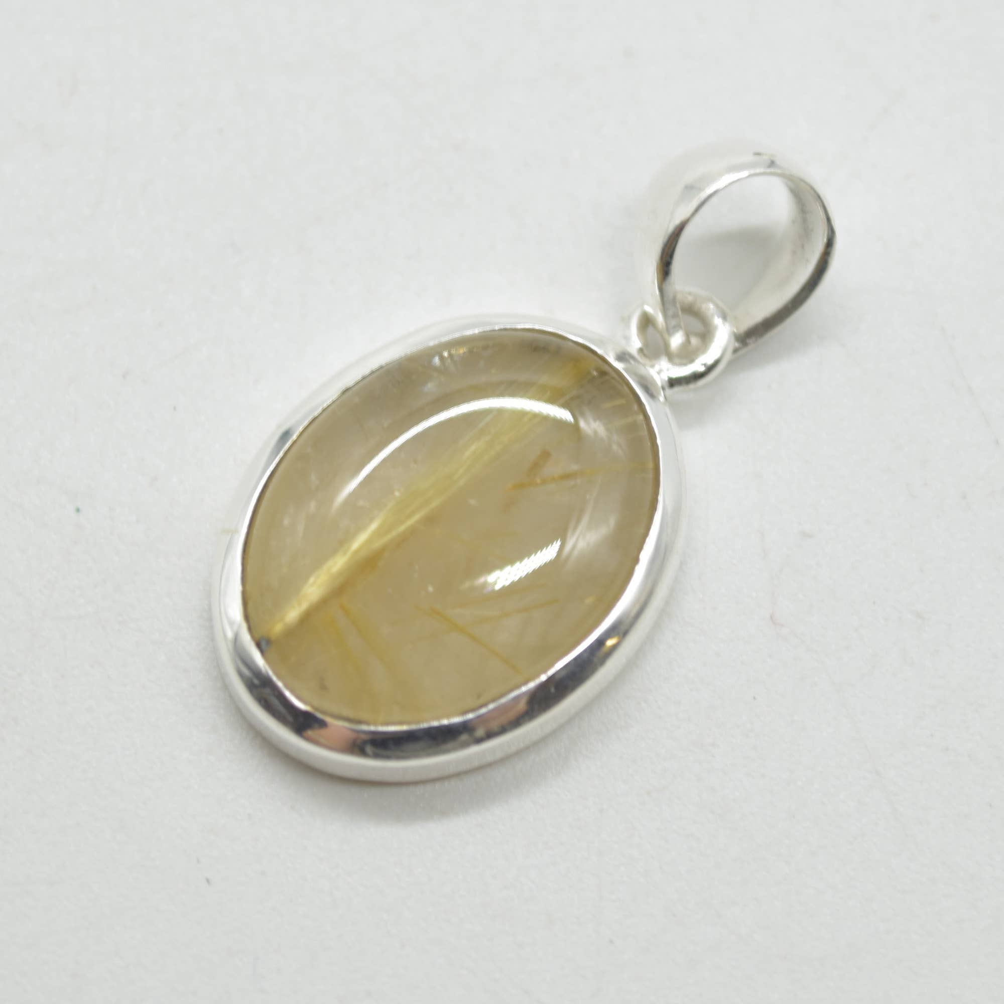 Golden Rutilated Quartz Oval Pendant in Sterling Silver