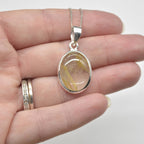 Golden Rutilated Quartz Oval Pendant in Sterling Silver