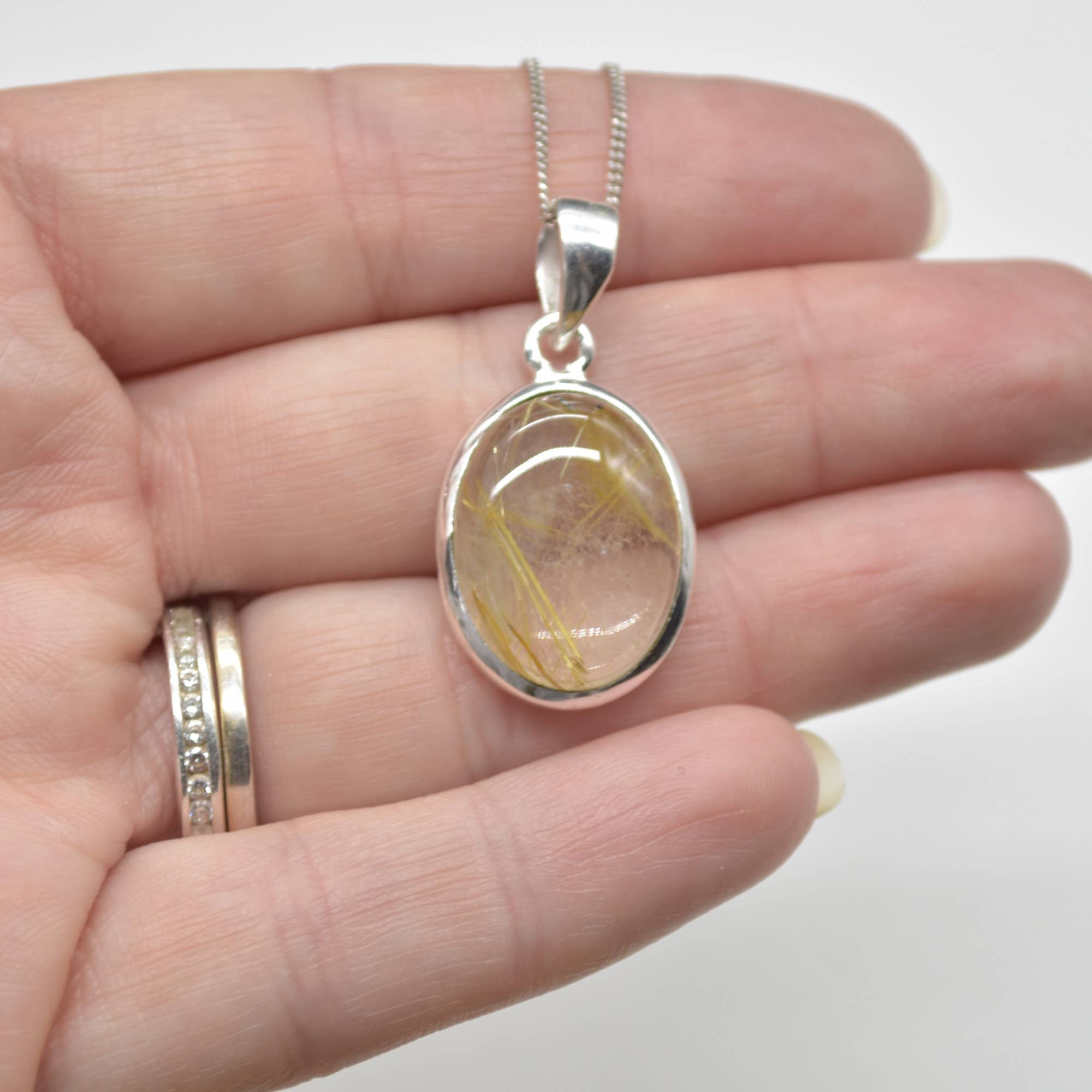 Golden Rutilated Quartz Oval Pendant in Sterling Silver