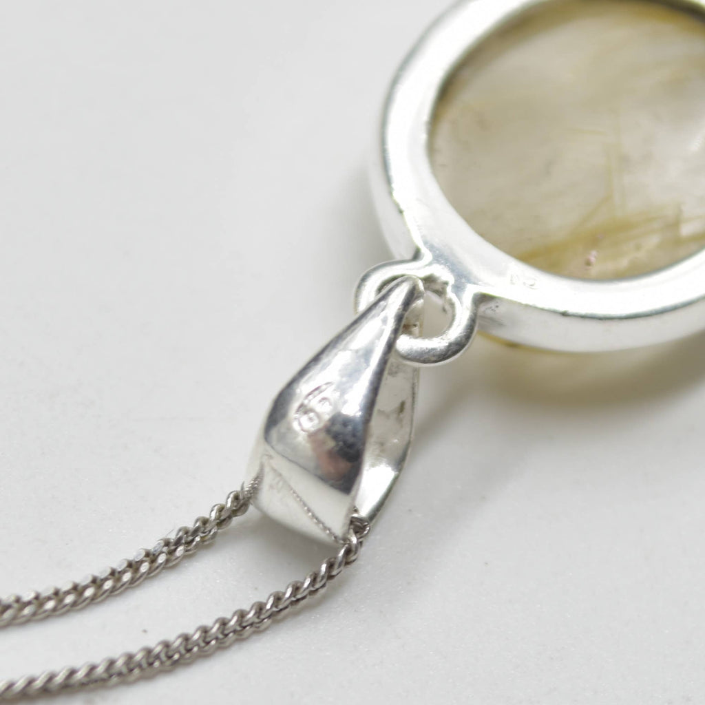 Golden Rutilated Quartz Oval Pendant in Sterling Silver