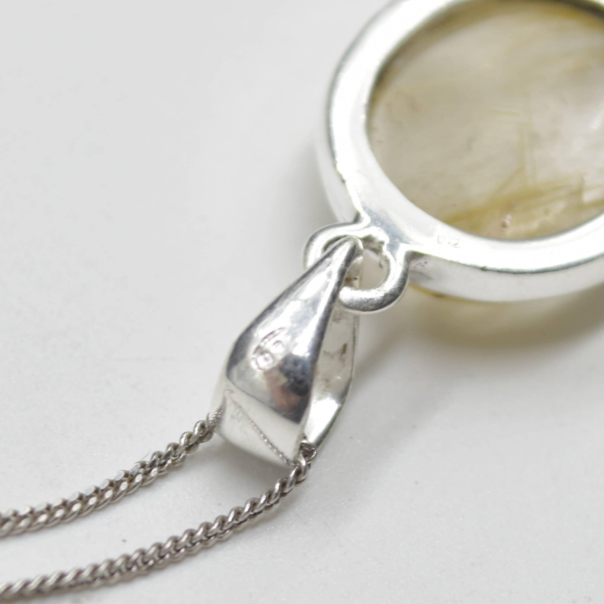 Golden Rutilated Quartz Oval Pendant in Sterling Silver