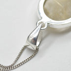 Golden Rutilated Quartz Oval Pendant in Sterling Silver