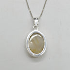 Golden Rutilated Quartz Oval Pendant in Sterling Silver