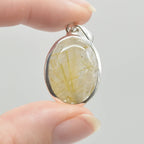 Golden Rutilated Quartz Oval Pendant in Sterling Silver