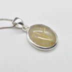 Golden Rutilated Quartz Oval Pendant in Sterling Silver